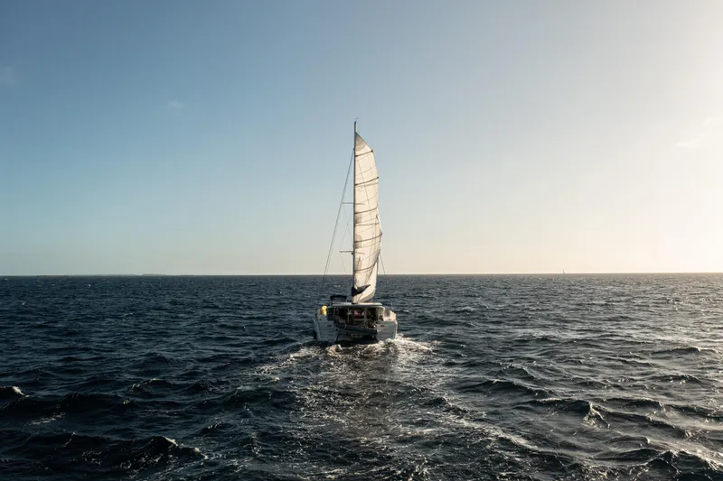 Slide: The Image of Sailing Lagoon 400 catamaran on open sea under clear sky, 2012 model. - 47