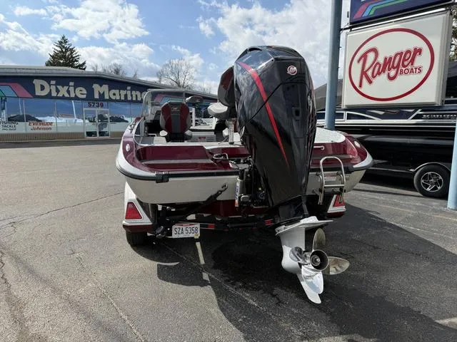 Slide: The Image of 2020 Ranger 621FS boat at Dixie Marine dealership, featuring powerful outboard motor. - 11