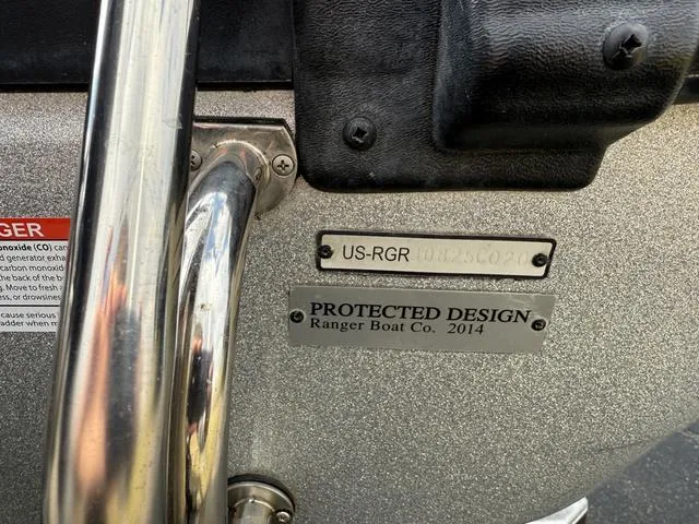 Slide: The Image of 2020 Ranger 621FS boat with protected design plaque, serial number visible. - 12