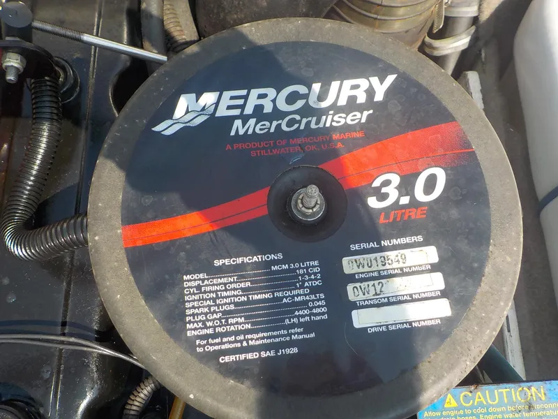 Slide: The Image of Mercury MerCruiser 3.0L engine in 2004 Bayliner International 195 Classic boat. - 12