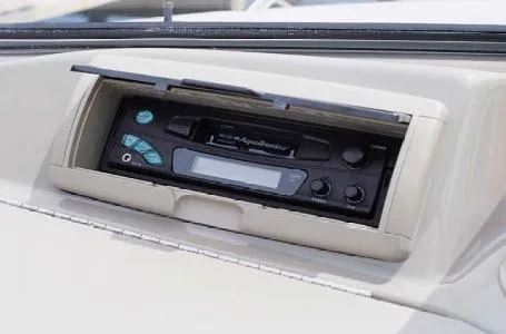 Slide: The Image of 2004 Bayliner 195 Classic boat stereo system with control panel and display. - 4