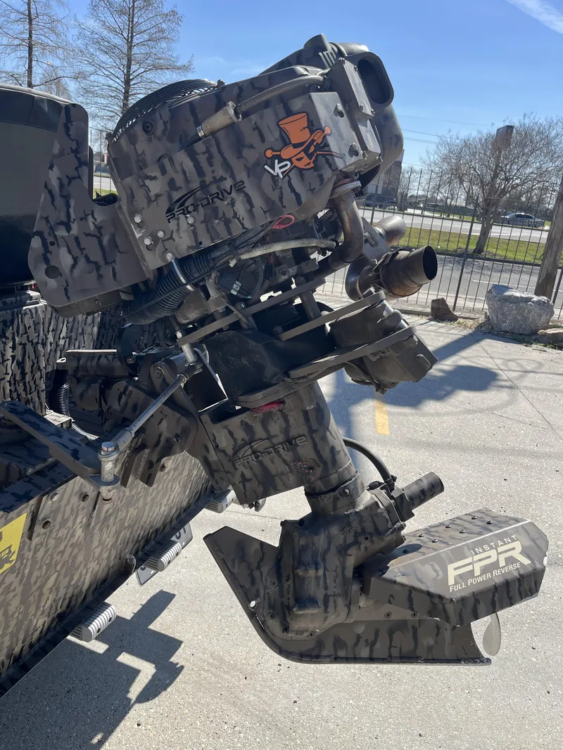 Slide: The Image of 2023 Pro-Drive SBX 1854 Stick Drive outboard motor with camouflage design. - 15