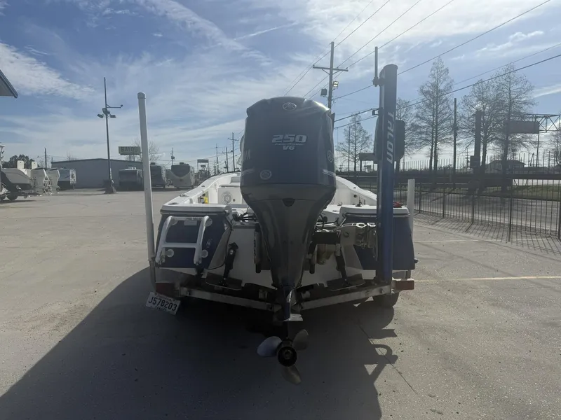 Slide: The Image of 2013 BlackJack 224 boat with Yamaha 250 V6 engine in a parking lot. - 8