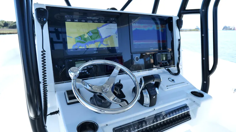 Slide: The Image of Freeman 34VH 2022 boat dashboard with navigation and control systems. - 27