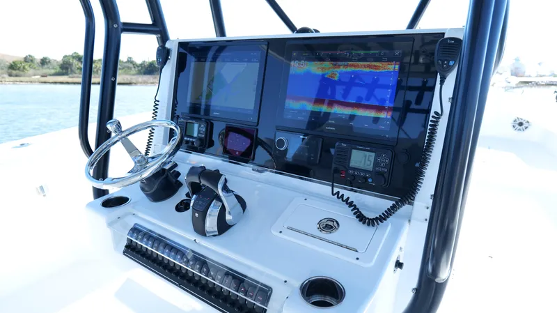 Slide: The Image of Freeman 34VH 2022 boat dashboard with advanced navigation and control systems. - 29