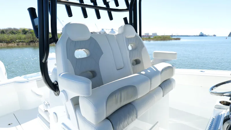 Slide: The Image of Luxury seating on 2022 Freeman 34VH boat, featuring sleek design and waterfront view. - 32