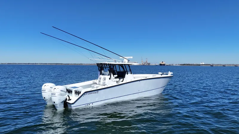 Slide: The Image of 2022 Freeman 34VH boat on open water under clear blue sky. - 8