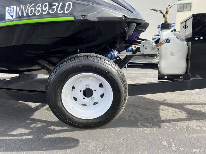 Slide: The Image of 2021 Yamaha WaveRunner GP1800R on trailer, close-up of wheel and registration number. - 10