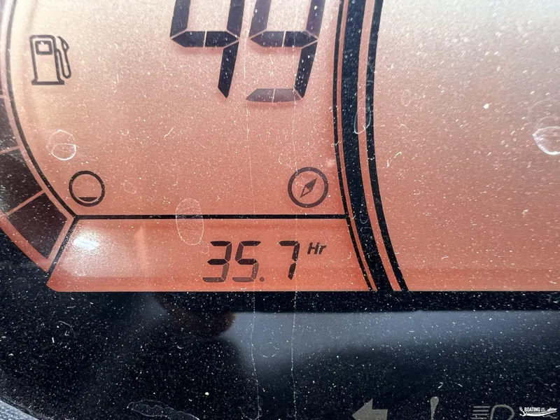 Slide: The Image of Yamaha WaveRunner GP1800R dashboard showing 35.7 hours usage, fuel gauge visible. - 11