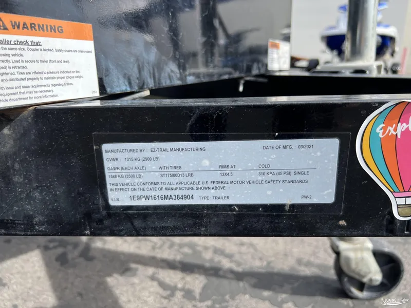 Slide: The Image of Close-up of a 2021 Yamaha WaveRunner trailer label with specifications and warnings. - 15