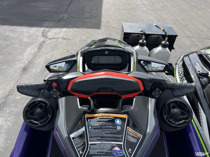 Slide: The Image of 2021 Yamaha WaveRunner GP1800R/Sea Doo RTX300 dashboard with controls and safety instructions. - 6