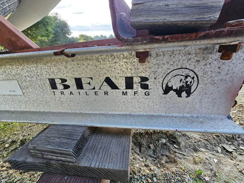 Slide: The Image of Bear Trailer MFG logo on metal frame, Eduardono RIB 1996 model. - 16