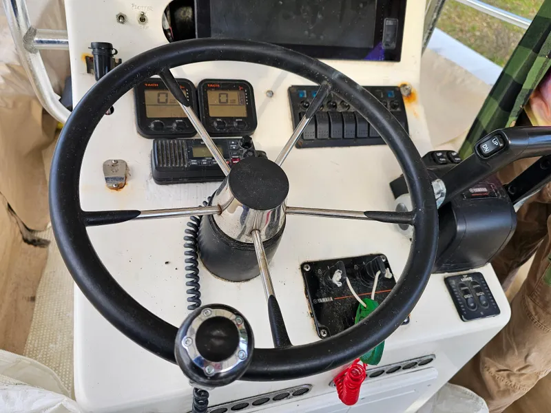 Slide: The Image of Steering console of a 1996 Eduardono RIB boat with navigation instruments. - 6