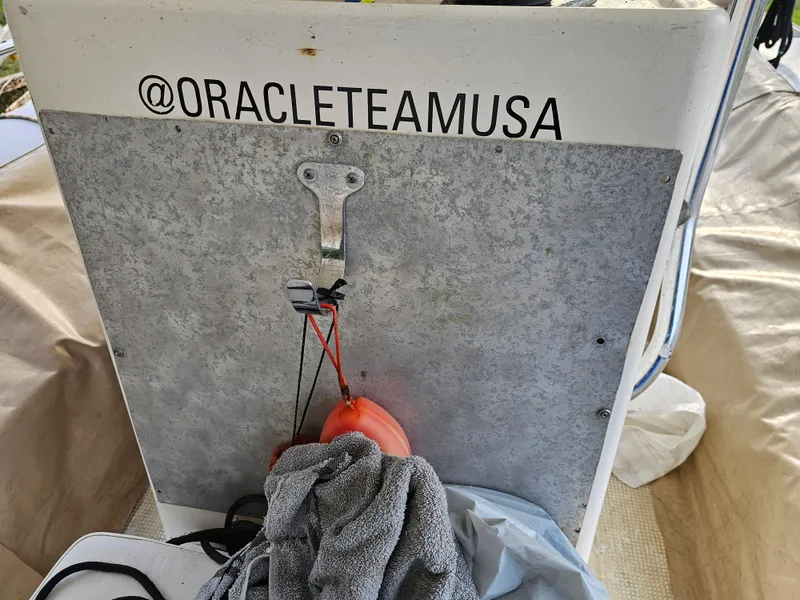 Slide: The Image of Eduardono RIB 1996 boat with Oracle Team USA branding and equipment. - 8