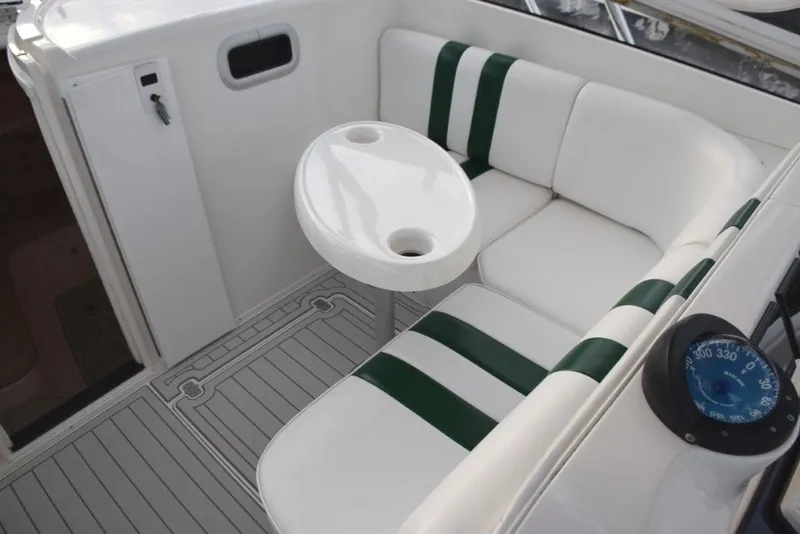 Slide: The Image of Settee forward of helm with table, cabin entry - 11