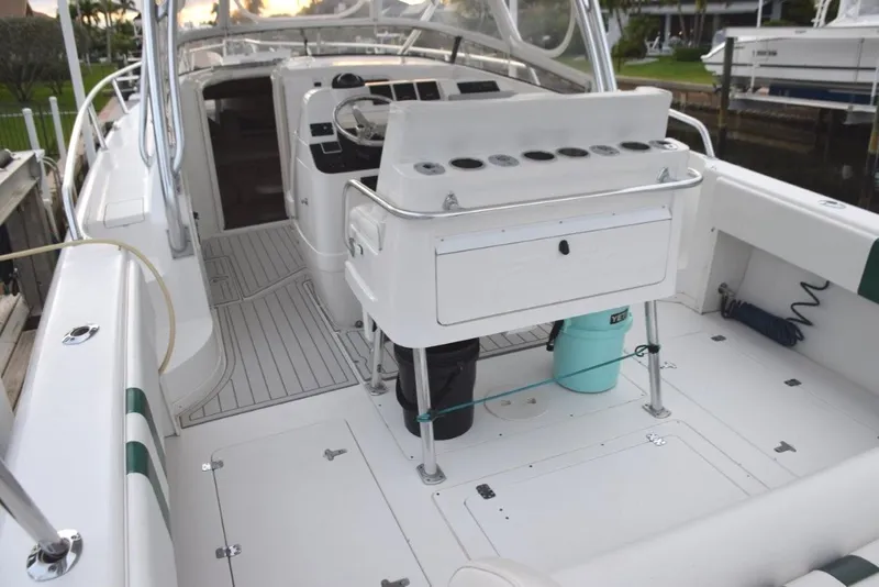 Slide: The Image of Rocket launcher/drink holders/safety rail behind helm seat - 14