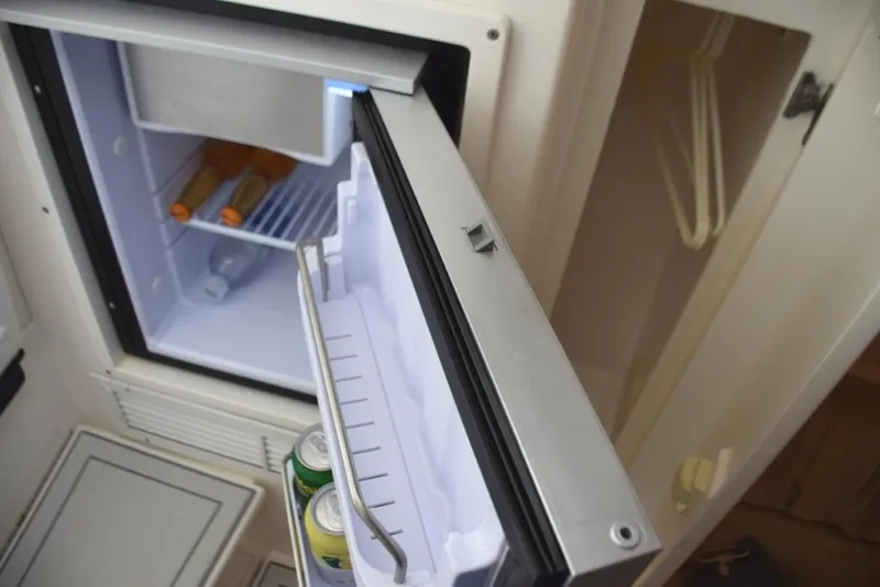 Slide: The Image of Fridge with freezer section, hanging locker - 21