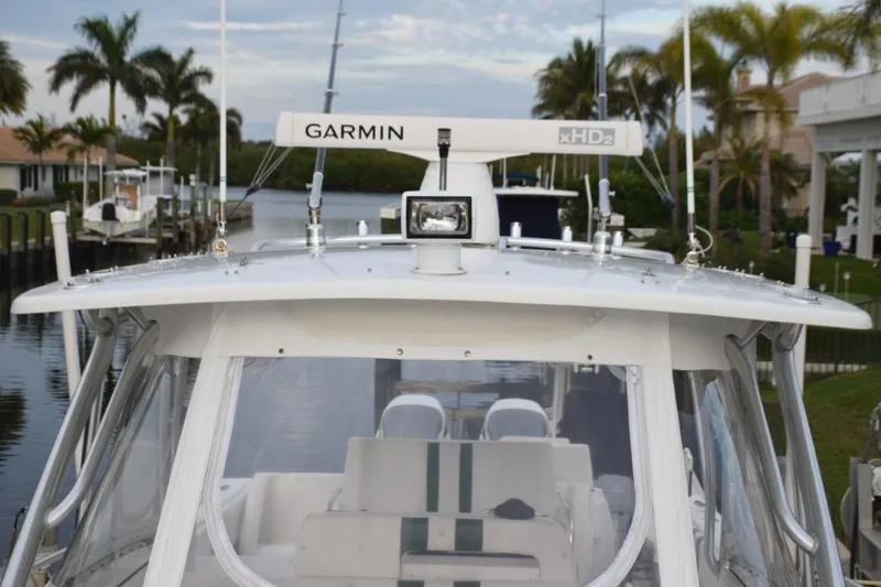Slide: The Image of Hardtop with spotlight, Garmin open array radar, outriggers - 26
