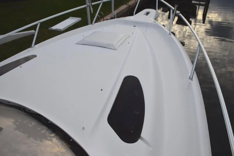 Slide: The Image of Foredeck has a snap down cushion not pictured - 27