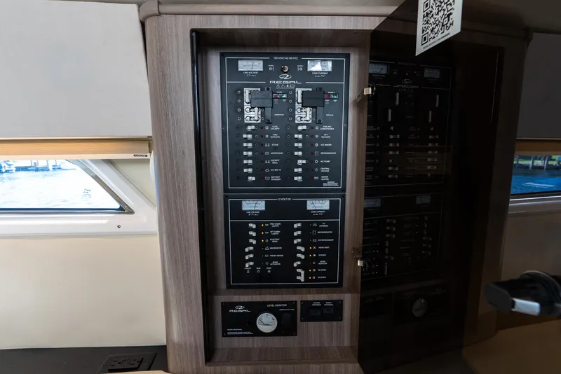 Slide: The Image of Electrical panel inside 2020 Regal 35 Sport Coupe boat cabin. - 26