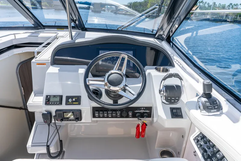 Slide: The Image of 2020 Regal 35 Sport Coupe helm with modern controls and navigation equipment. - 40