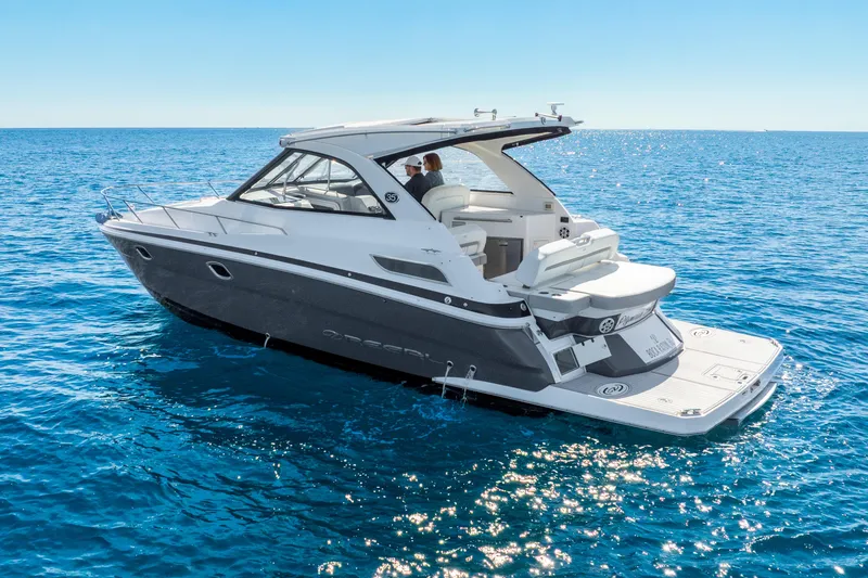 Slide: The Image of 2020 Regal 35 Sport Coupe cruising on open blue sea. - 6