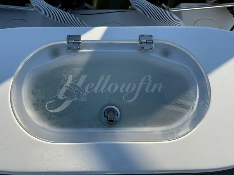 Slide: The Image of Livewell on 2025 Yellowfin 42 CC boat with logo on transparent lid. - 17