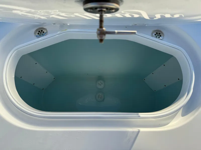 Slide: The Image of Livewell of 2025 Yellowfin 42 CC boat, featuring a spacious interior design. - 18
