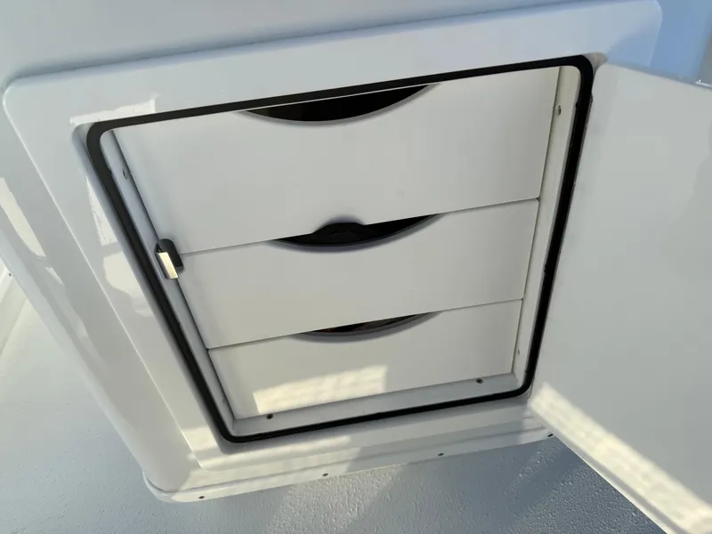 Slide: The Image of Storage compartment on 2025 Yellowfin 42 CC boat with three drawers. - 24