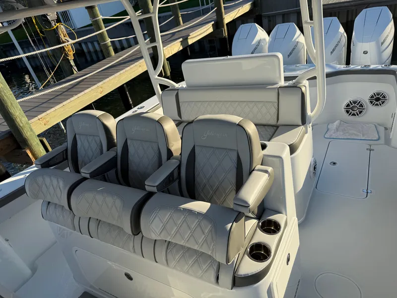 Slide: The Image of 2025 Yellowfin 42 CC boat interior with luxurious seating and modern design. - 29