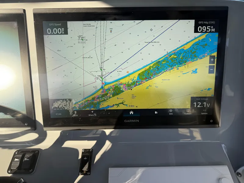 Slide: The Image of Garmin navigation display on 2025 Yellowfin 42 CC boat, showing detailed marine chart. - 34