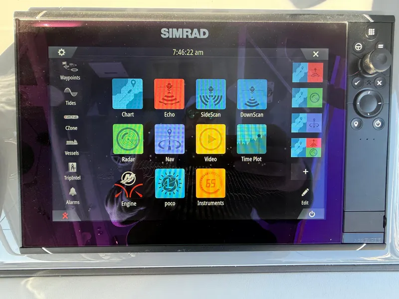 Slide: The Image of Simrad marine display on 2025 Yellowfin 42 CC, showing navigation and radar options. - 35