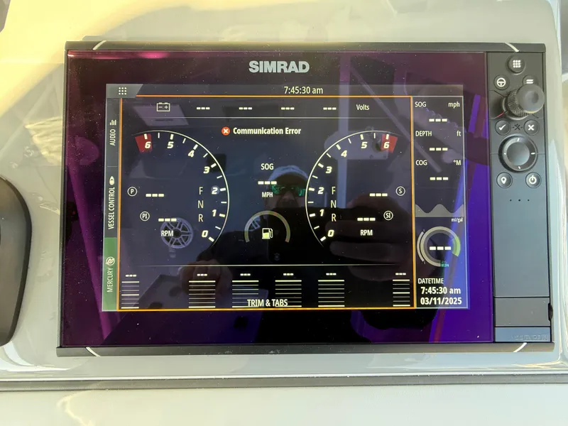 Slide: The Image of Simrad display showing communication error on 2025 Yellowfin 42 CC boat dashboard. - 36