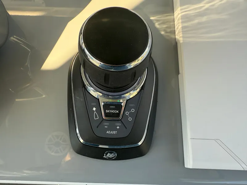 Slide: The Image of Joystick control panel on a 2025 Yellowfin 42 CC boat. - 37