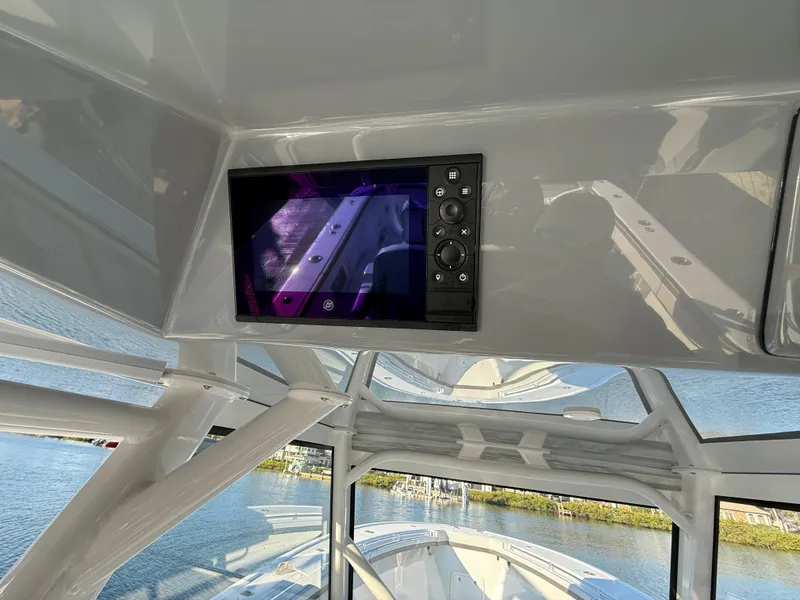 Slide: The Image of 2025 Yellowfin 42 CC boat interior with navigation screen, showcasing modern design and technology. - 38