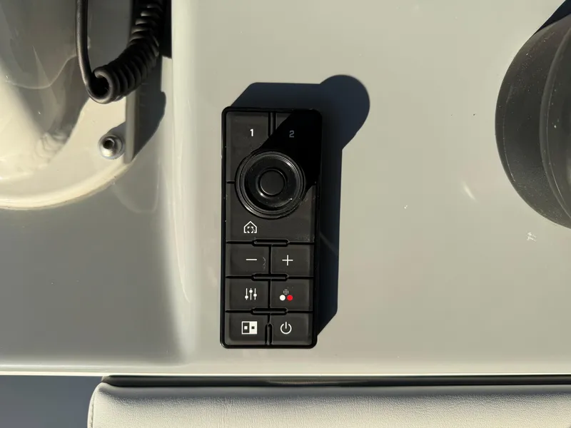 Slide: The Image of Control panel on 2025 Yellowfin 42 CC boat dashboard. - 39