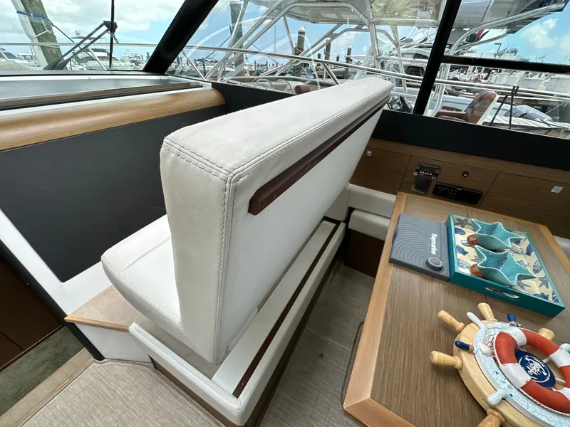 Slide: The Image of Interior of 2017 Jeanneau NC 11 yacht with seating and nautical decor. - 32