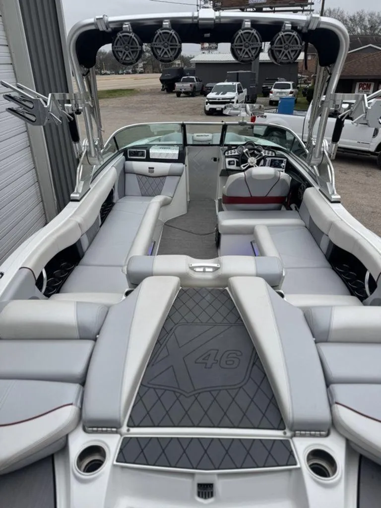 Slide: The Image of 2015 MasterCraft X46 boat interior with spacious seating and modern design. - 13