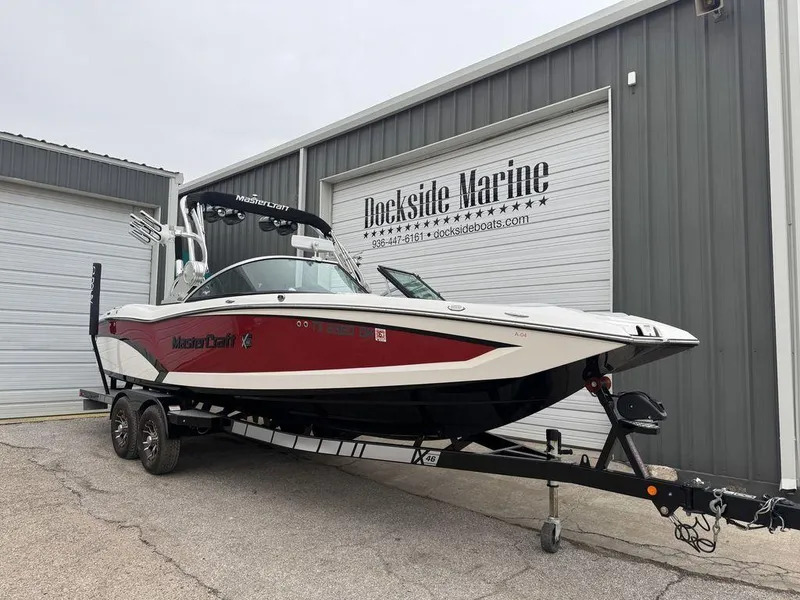Slide: The Image of 2015 MasterCraft X46 boat on trailer at Dockside Marine. - 23