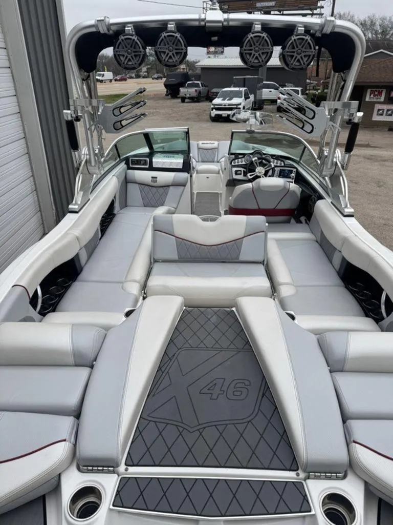 Slide: The Image of 2015 MasterCraft X46 boat interior with spacious seating and advanced audio system. - 4
