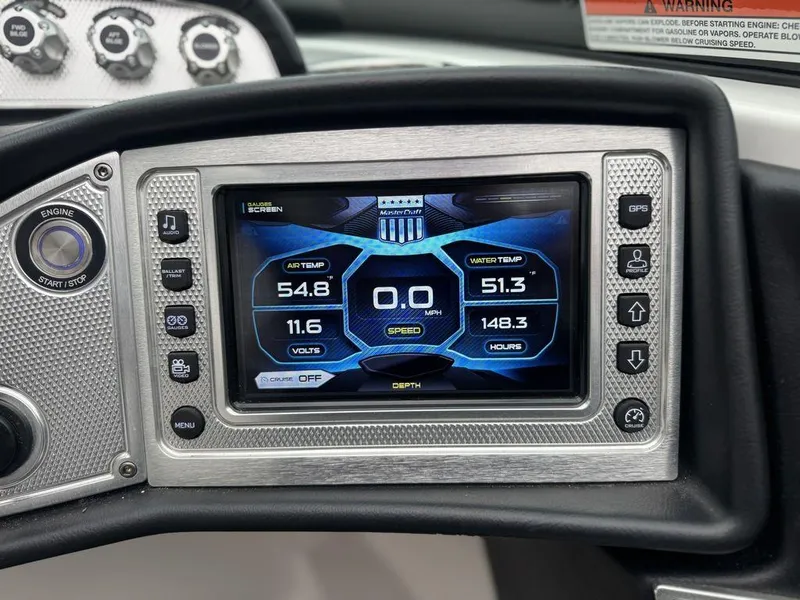 Slide: The Image of Dashboard of a 2015 MasterCraft X46 boat showing digital display and controls. - 7