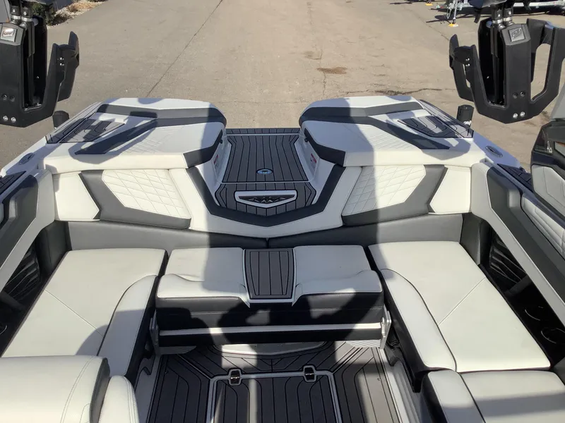 Slide: The Image of 2023 Nautique G21 boat interior with sleek seating and modern design. - 4