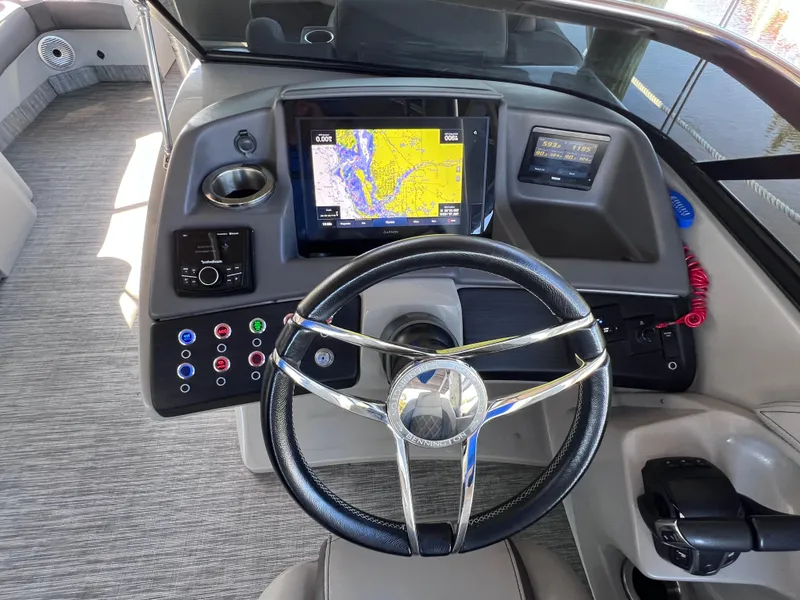 Slide: The Image of Steering console of 2021 Bennington QX 27 QFB X2 with navigation display. - 24
