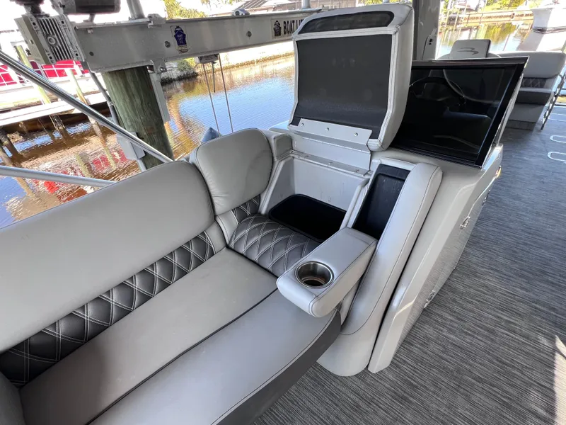 Slide: The Image of Luxurious seating on 2021 Bennington QX 27 QFB X2 boat with elegant upholstery. - 32