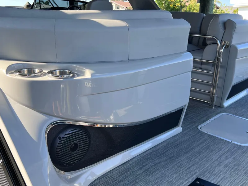 Slide: The Image of 2021 Bennington QX 27 QFB X2 interior with seating and cup holders. - 39