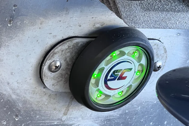 Slide: The Image of Close-up of a Bennington QX 27 QFB X2 boat light with green LEDs, 2021 model. - 41