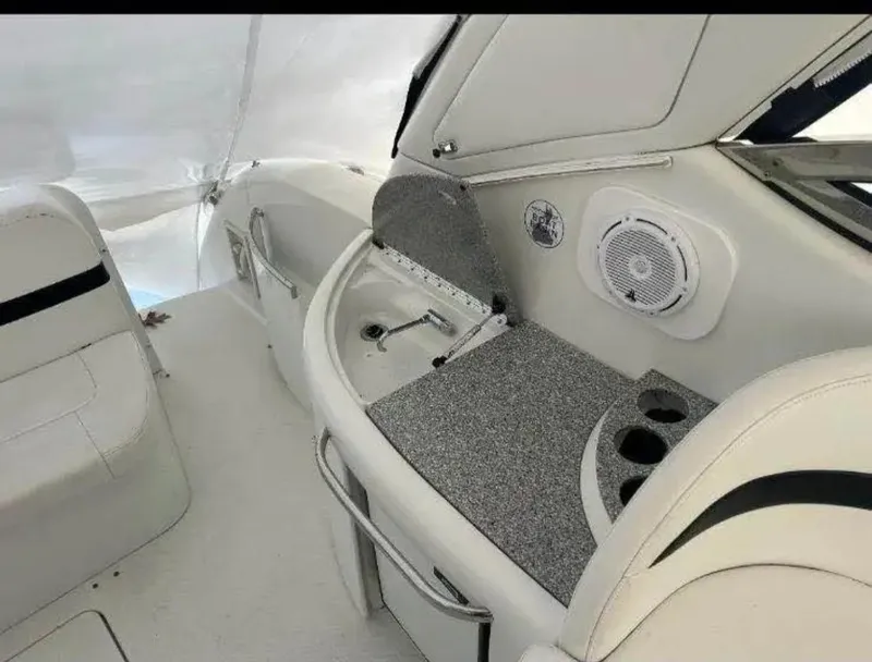 Slide: The Image of 2004 Formula 37 PC yacht interior with seating, sink, and speaker system. - 16