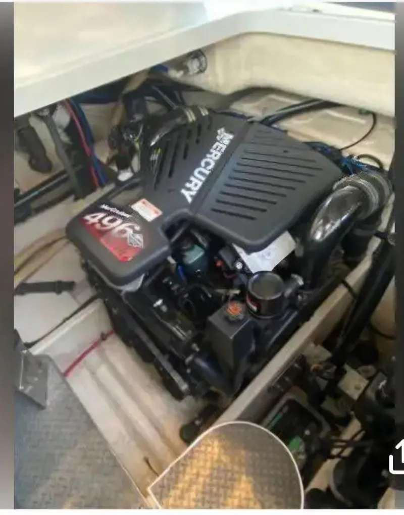 Slide: The Image of Engine compartment of a 2004 Formula 37 PC boat with a Mercury 496 motor. - 38