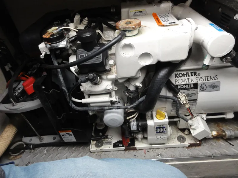 Slide: The Image of Kohler power system in a 2004 Formula 37 PC boat engine compartment. - 41
