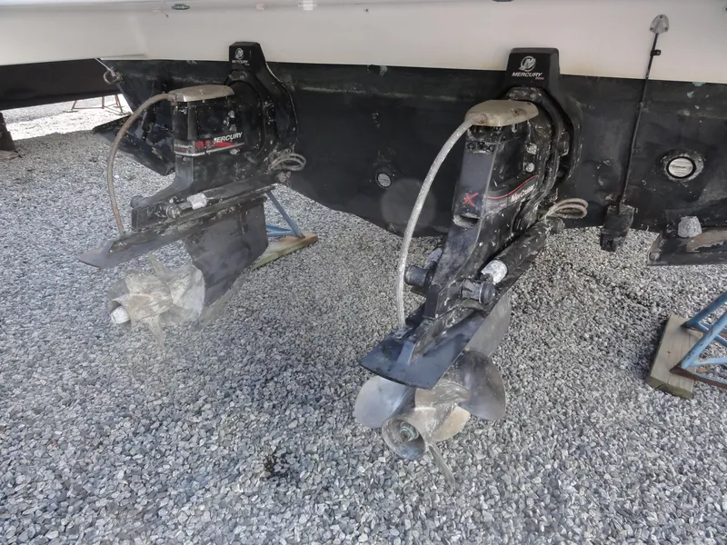 Slide: The Image of 2004 Formula 37 PC boat with dual outboard motors on gravel surface. - 47